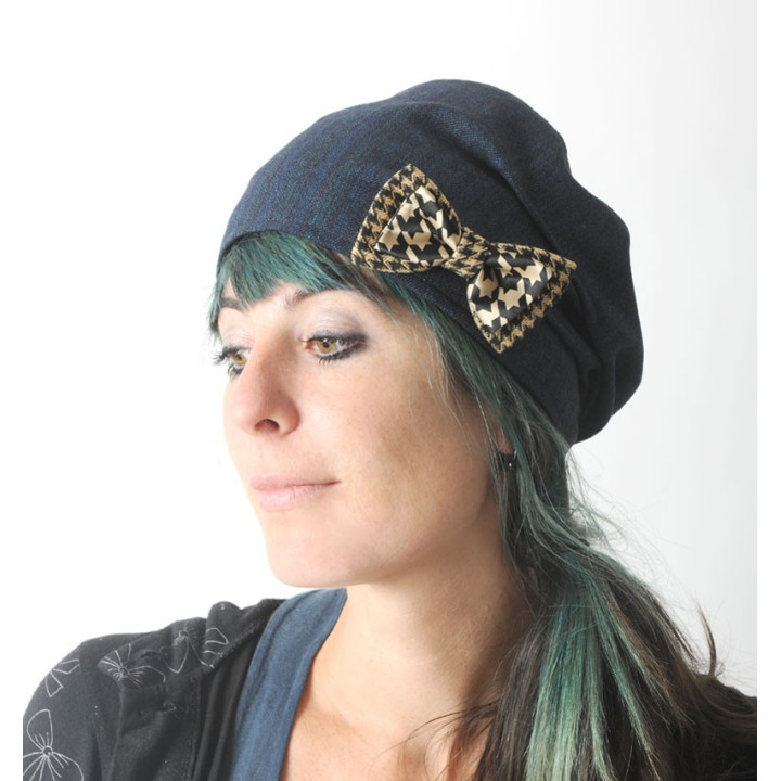 Golden and black fabric bow brooch