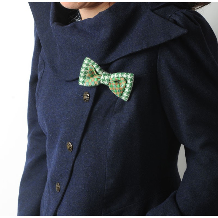 Golden and black fabric bow brooch