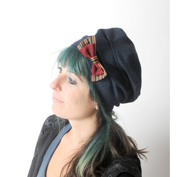 Golden and black fabric bow brooch