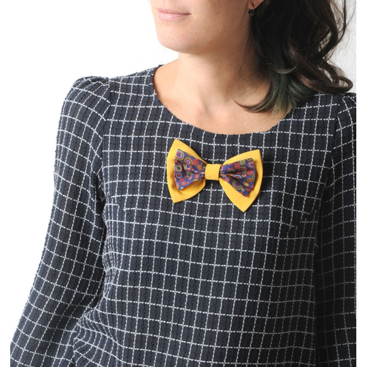 Golden and black fabric bow brooch