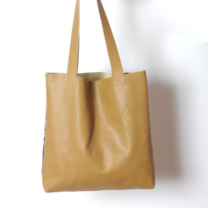 Beige leather shopping tote bag with vintage castle on the hill tapestry