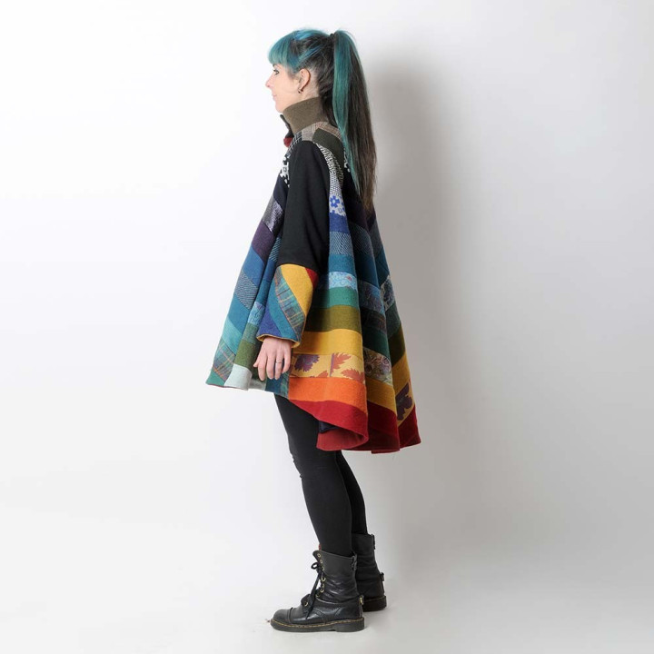 One-of-a-kind designer piece in multicoloured wool, combining a winter cape, artistic coat and custom handmade statement piece.