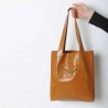 Orange leather shopping tote bag, with two pockets