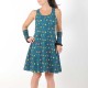 Colorful cotton jersey dress with bird print, crossed straps and flared cut
