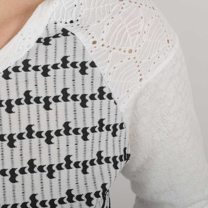 White and black womens top, eyelet jersey