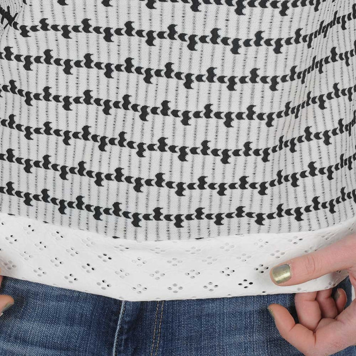 White and black womens top, eyelet jersey