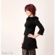 Black jersey tunic with wide cowl and ruffles