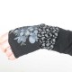 Long black armwarmers in a patchwork of solid and floral jersey