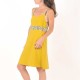 Short mustard yellow dress with straps, geometric details