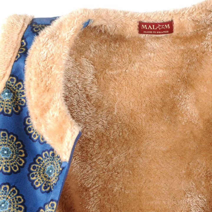 Gilet sans manches artisanal bleu motif fleuri, fausse fourrure beige