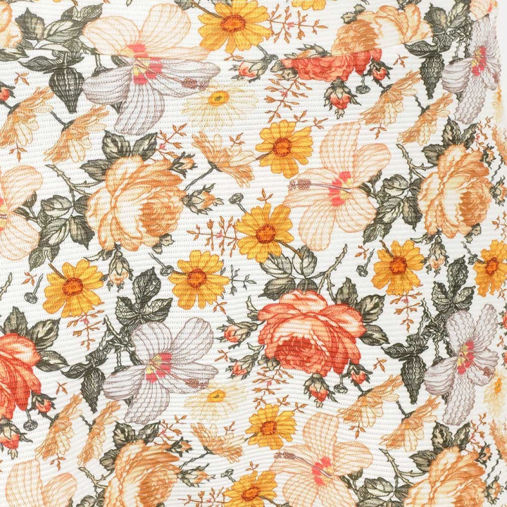 Jupe courte originale fabriquée en France fleurie beige et tons orangés