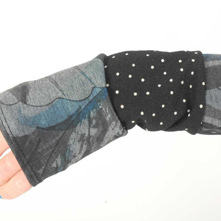 Long jersey armwarmers in a patchwork of grey print and white dots