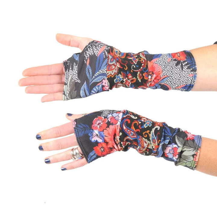 Long floral armwarmers in a patchwork of black and colorful jersey