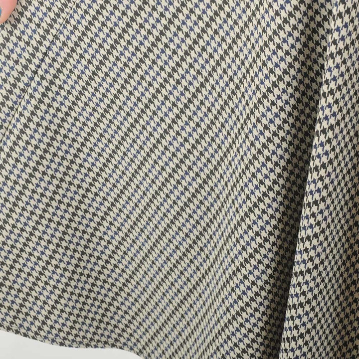 Flared beige and black houndstooth jersey skirt