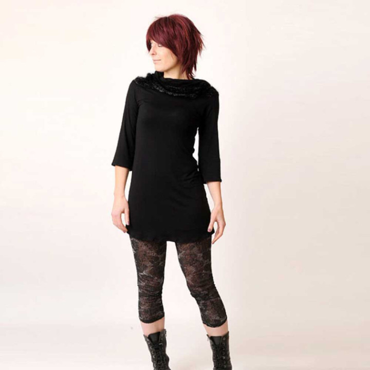 Black jersey tunic with wide cowl and ruffles