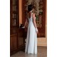 Long white wedding dress with low back neckline and empire waist