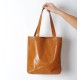Dark orange leather shopping tote bag, with two pockets